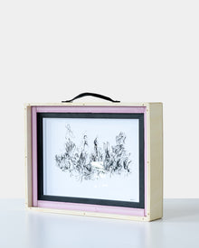 Framed artwork “Melancholy” by Ali Khanafer secured inside a custom wooden crate with pink foam edges, showcasing premium art packaging by GEMS.