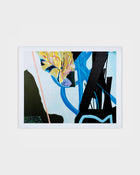 Graphic and energetic print “Transfert” by Diane Roe, with electric hues of blue, yellow, and black intersecting across the canvas.